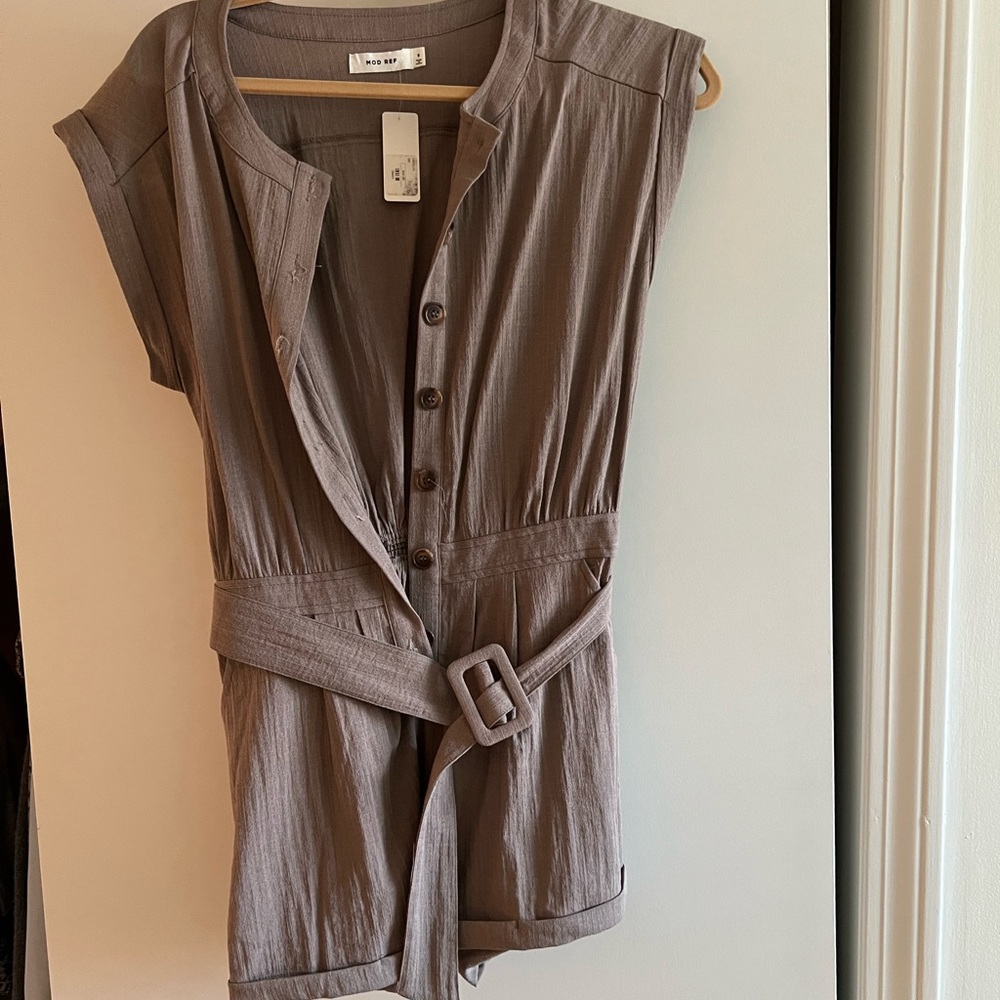 Tan Romper size small. Never worn!